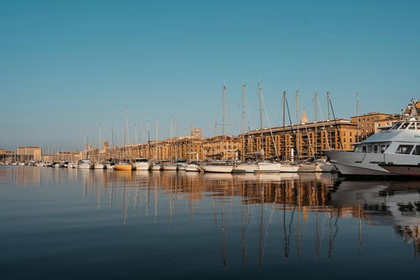 A tranquil view of Marseille’s harbor, with boats and yachts capturing the charm of this iconic French coastal city.