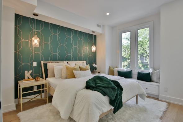 A well-appointed bedroom in a vacation rental, showcasing how thoughtful design and furnishings can attract guests and increase booking potential. Securing the right financing, such as a DSCR or conventional loan, is the first step toward acquiring a profitable property like this.