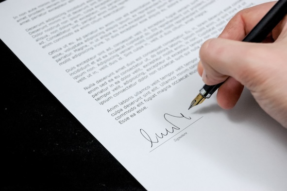 Digital contract signature system for short-term rental agreements showing electronic signing workflow and legal document management for vacation rental properties